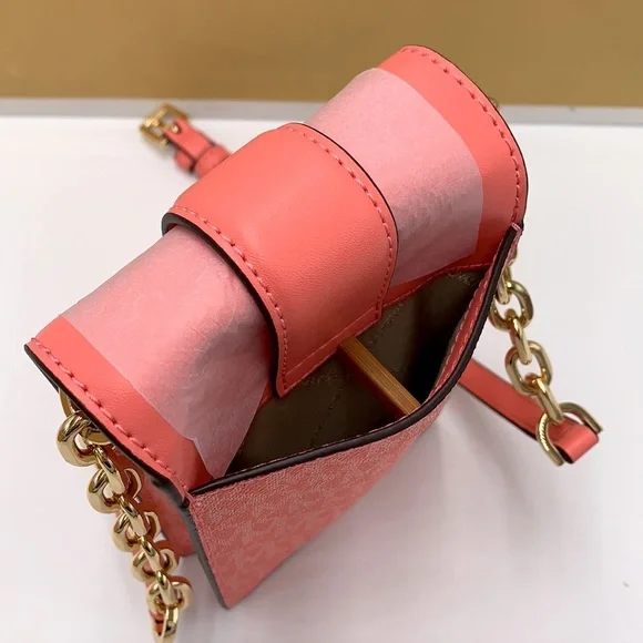 Michael Kors Carmen Small NS Logo
Smartphone Crossbody GRAPEFRUIT SIGNATURE - Picture 4 of 16